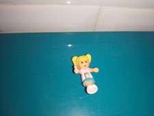 Polly pocket figurine doll