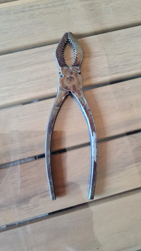 Rare ancienne pince - a, bouchon