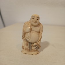 Sculpture Okimono japonaise - Homme serviette