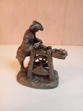 le remouleur de couteaux en