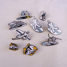 9 pin's Surfeur d'argent