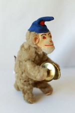 Jouet singe ancien articulé en peluche