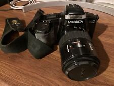 Reflex argentique Minolta Dynax 5000i + 3 objectifs + 2 filtres + sacoche