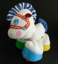 *. Doudou jouet d'activité