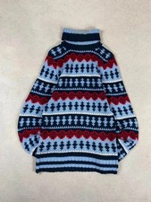 Pull long col roulé