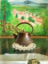 Théière ancienne en fonte