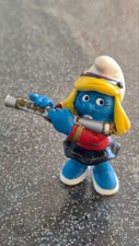 N°20487 FIGURINE SCHTROUMPFETTE FLUTISTE FANFARE MUSICIENNE