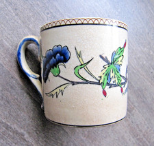 très ancienne tasse faïence