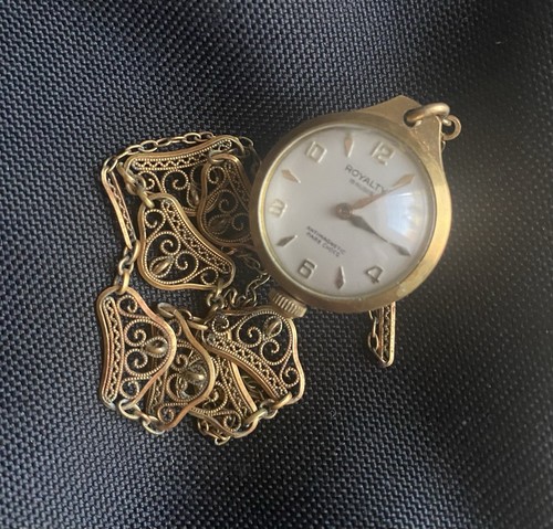 Petite montre globe squelette