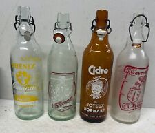 4 Bouteilles de limonade, cidre et autre plublicitaire (1litre)