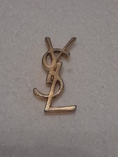 Ancien Petit Pin's Yves Saint