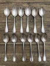 Christofle rubans croisés 12 cuillères a café en métal argenté