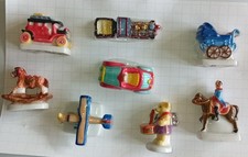 serie de 8 feves la mlle aux jouets 2006 prime