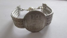 Bracelet, monté d'une monnaie