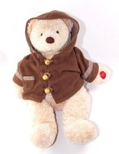 Peluche ours beige manteau