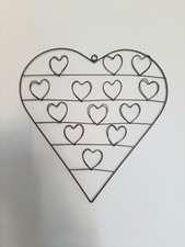 Porte photo en métal marron .  . Pêle- mêle photos