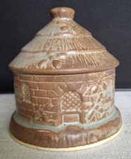 tirelire à casser en forme de ruche