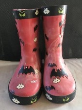 bottes caoutchouc halloween abîmées mais rigolotes pour la période d'halloween