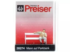 PREISER Homme assis sur un