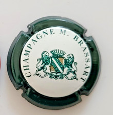 Capsule Champagne M. BRASSART Blason Nom circulaire Contour vert Centre blanc