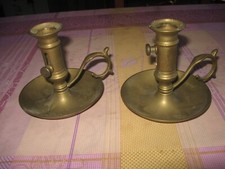 2 anciens bougeoirs à poussoir