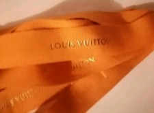 Louis Vuitton Ruban de  2 m orange écriture doré Neuf et Authentique 