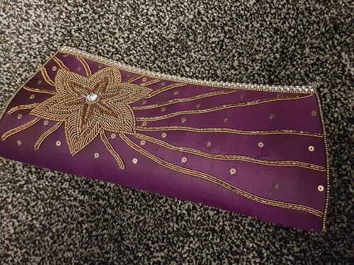 Pochette avec détails perles