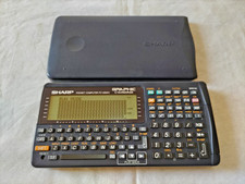 Ordinateur de poche SHARP d'occasion testé PC-G850V fonctionnel avec suivi (iii)