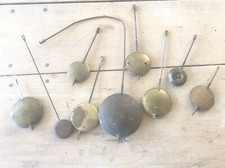LOT DE  9 ANCIENS BALANCIERS DE PENDULES XIXe