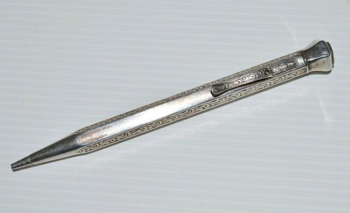 Superbe porte mine argent - porte,