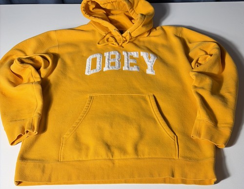 Obey worldwide yellow logo - obey,