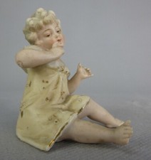 ANTIQUE BISQUE PIANO BABY BEBE