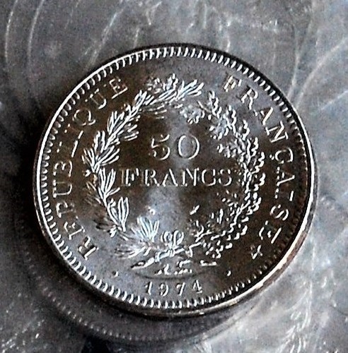 Une pièce francs - une,