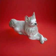 Superbe figurine chien loulou de pomeranie en porcelaine vintage