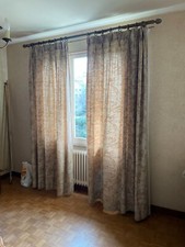 4 grands doubles rideaux en bon état .