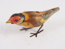 Jouet oiseau mécanique