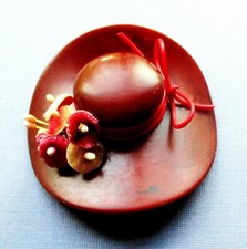 VINTAGE BAKELITE HAT BROOCH