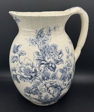 Broc en faïence KG Lunéville début XXème modèle Rocaillé décor floral bleu