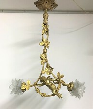 Lustre en bronze " angelot " à deux lumières époque XIXème siècle