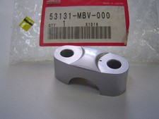 Pontet supérieur de guidon de