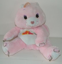 Peluche BISOUNOURS sac à dos