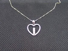 chaine pendentif en Or blanc