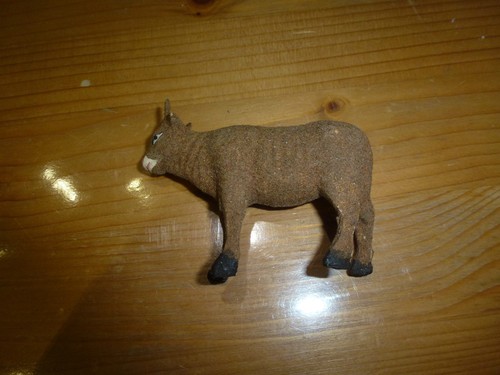 Petite figurine vache floqué