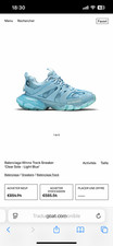 balenciaga track bleu ciel, taille 44, bon état mais un peu Sal à laver !