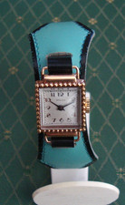 Trés belle montre femme-RALCO- mécanique carrée plaqué or de 1960