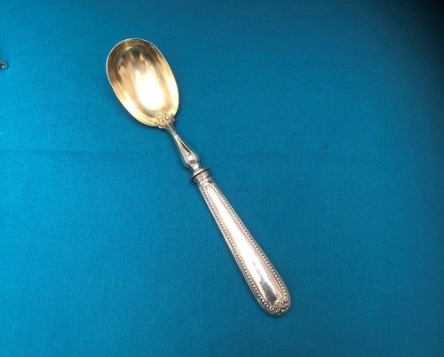 Cuillère service à - de,