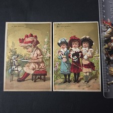 AU BON MARCHE 2 Chromos Dorés