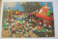 Rare puzzle BD Schtroumpfs avec les figurines plastiques  Le village. 140 pièces