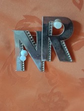 ancienne broche nina Ricci