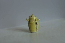 Fève - UN POT JAUNE AVEC COUVERCLE ET ANSES